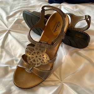 Clarks sandals- leather- bronze-worn one time- like new- excellent condition.